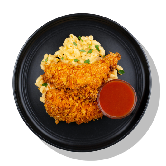 Buffalo Chicken Tenders: Cornflake breaded chicken tenderloins, dressed in buffalo sauce with smoked gouda mac & cheese and a side of spicy honey.