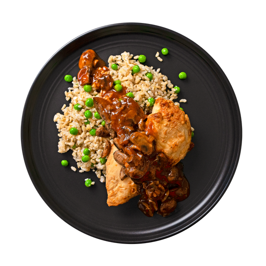 Chicken Marsala: Baked chicken breast topped with a robust marsala mushroom sauce served over brown rice & green pea risotto.