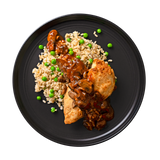 Chicken Marsala: Baked chicken breast topped with a robust marsala mushroom sauce served over brown rice & green pea risotto.