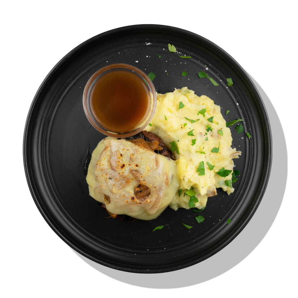 French Onion Burger: A grilled grass-fed beef patty topped with swiss cheese and a caramelized onion and sherry wine sauce served with creamy mashed potatoes.