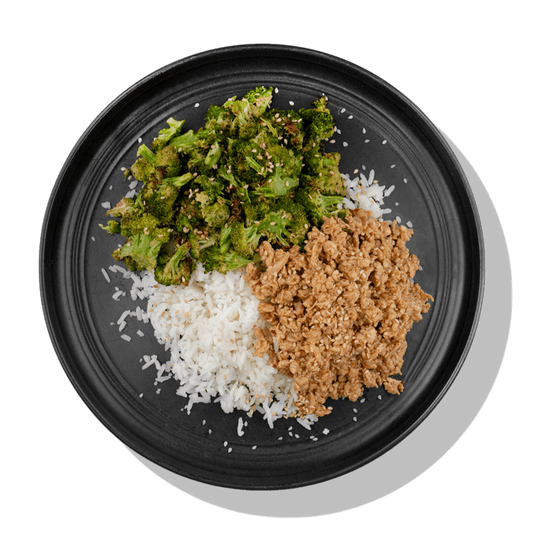 Honey Chili Chicken: Lean ground chicken seasoned with our sweet honey chili sauce served with a side of steamed white rice and roasted broccoli.